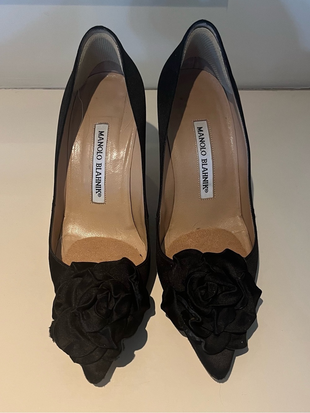 Manolo Blahnik Black Satin Pointed Toe Pumps with Rosette Detail